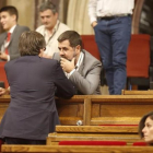 El president Carles Puigdemont junto a Jordi Sànchez (ANC).