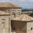 El castillo y el palacio de Grajal de Campos y vista de Sahagún con la Peregrina en primer término. A la izquierda, San Tirso de Sahagún.