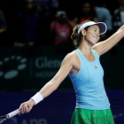 Muguruza se despide del público de Singapur tras ganar a Kuznetosva.