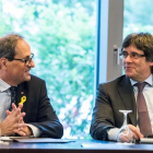 El president de la Generalitat, Quim Torra, y el expresidente Carles Puigdemont, en un encuentro en Berlín el pasado junio.
