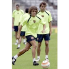 Carles Puyol (a la izquierda) y Santi Ezquerro durante un entrenamiento