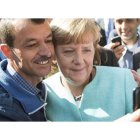 Merkel,durante la visita de ayer a la Oficina Federal de Migración y Refugiados en Berlín.