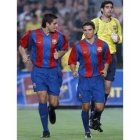 Riquelme y Saviola, en un momento de la presentación del Barcelona