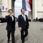 El aún jefe de Estado galo, Nicolas Sarkozy, junto al presidente electo, François Hollande.