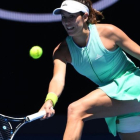Garbiñe Muguruza, con el muslo vendado, en su partido ante Erakovic.