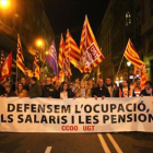 Cabecera de la manifestación por una ocupación digna en Barcelona.
