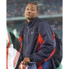Marion Jones, con la bandera de Estados Unidos en Sidney 2000