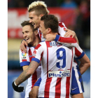 Griezmann, Mandzukic y Saúl celebran la victoria.