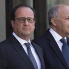 Hollande y el ministro de Exteriores francés, Fabius.