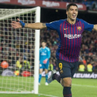 Luis Suárez celebra su tercer gol al Madrid.