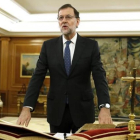 El presidente del Gobierno, Mariano Rajoy, jura el cargo en el Palacio de la Zarzuela, el pasado 31 de octubre.