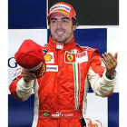Fotomontaje de Fernando Alonso con el uniforme de Ferrari.
