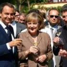 Rodríguez Zapatero y Ángela Merkel brindan durante la XX Cumbre entre España y Alemania