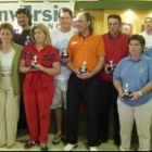 Los ganadores del Torneo Inversis Banco posan con sus trofeos