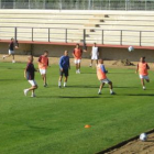 Varios jugadores durante la sesión de entrenamiento de ayer.