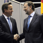 El primer ministro británico, Cameron, se entrevistó ayer con Rajoy en Chicago.