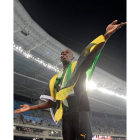 Usain Bolt se despide con tres oros en Río. FRANCK ROBICHON