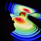 Un científico observa una recreación de las ondas gravitacionales. JULIAN STRATENSCHULTE