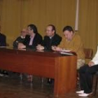 Antonio Recio y Nicanor Sen, sentados en el centro de la mesa