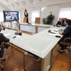 Mañueco, Igea y Carriedo ayer, durante la reunión por videoconferencia con Margrethe Vestager. R. GARCÍA