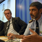 El mayor de los Mossos, Josep Lluís Trapero, con los consejeros de Interior, Joaquim Forn, y el de Justicia, Carles Mundó