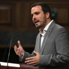 Alberto Garzón, líder de Izquierda Unida, en su intervención durante la primera ronda de la investidura de Pedro Sánchez.