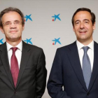 Jordi Gual y Gonzalo Gortázar, presidente y consejero delegado de CaixaBank.