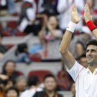 Djokovic celebra su victoria ante Rosol.