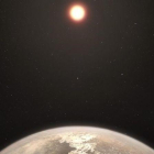 Recreación artística del planeta Ross 128 b con su estrella enana roja anfitriona al fondo.