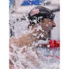 Michael Phelps celebra su séptima medalla de oro e iguala a Mark Spitz