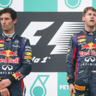 Webber y Vettel, tensos y distantes en el podio de Sepang.