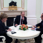 Merkel, Putin y Hollande en la reunión en el Kremlin.