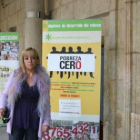 La presidenta de la Diputación, Isabel Carrasco, en una exposición contra la pobreza en el Palacio d