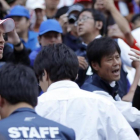 Sebastian Vettel saluda a una multitud de seguidores japoneses, en Suzuka.