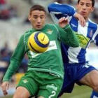 El espanyolista Maxi y Luis Fernández, del Betis en el partido de ayer