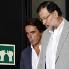Aznar y Rajoy cierran el curso de verano de la FAES, en julio del 2015.