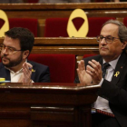 Pere Aragonès y Quim Torra, en el Parlament.