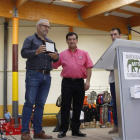 EL pregonero, Michel Coya, junto al alcalde de Boñar, Roberto Álvarez, durante la inauguración de la muestra, que reúne a cerca de medio centenar de expositores. CAMPOS