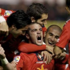 Pandiani celebra la victoria junto a sus compañeros