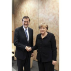 Mariano Rajoy y Angela Merkel, el pasado diciembre en Marsella, durante la cumbre del Partido Popular Europeo.