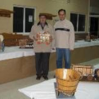 Quintanilla y Castellanos posan delante de la muestra de maquetas
