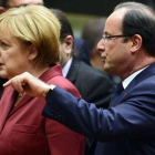 Angela Merkel y Franços Hollande, al inicio de la cumbre, en Bruselas.