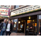 Fernando Otero y Xandru Fernández, ante la sede del festival que acaba de premiar su película ‘More than a barbershop’. DL