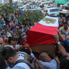 Funeral por un capitán de policía fallecido en el enfrentamiento armado, a 15 kilómetros de El Cairo, el 21 de octubre.