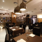 Comedor de El Soportal, cuya decoración mezcla con total sintonía ladrillo, madera y canto rodado. Tiene capacidad para unos 60 comensales.