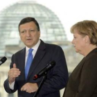 Merkel y Barroso, en una rueda de prensa en la Cancillería alemana en Berlín.