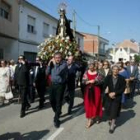 Casi todo el pueblo se dio cita a mediodía para acompañar a su patrona en la procesión