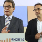 El nuevo coordinador general de CiU tras la marcha de Oriol Pujol, Josep Rull, junto a Artur Mas.