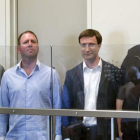 El fundador de MegaUpload, Kim Schmitz (derecha), junto a sus colaboradores.