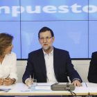 Cospedal, Rajoy y Montoro, al inicio de la reunión de ayer.